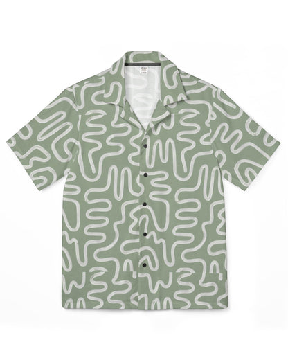 Green shirt with white abstract pattern on a white background