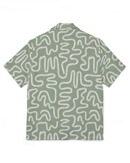 Green shirt with white abstract pattern on a white background