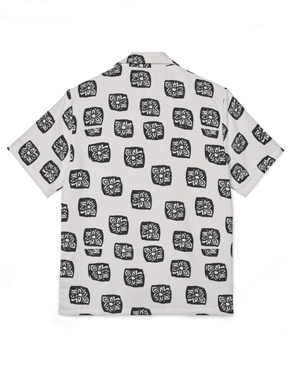 White shirt with black geometric pattern on a white background