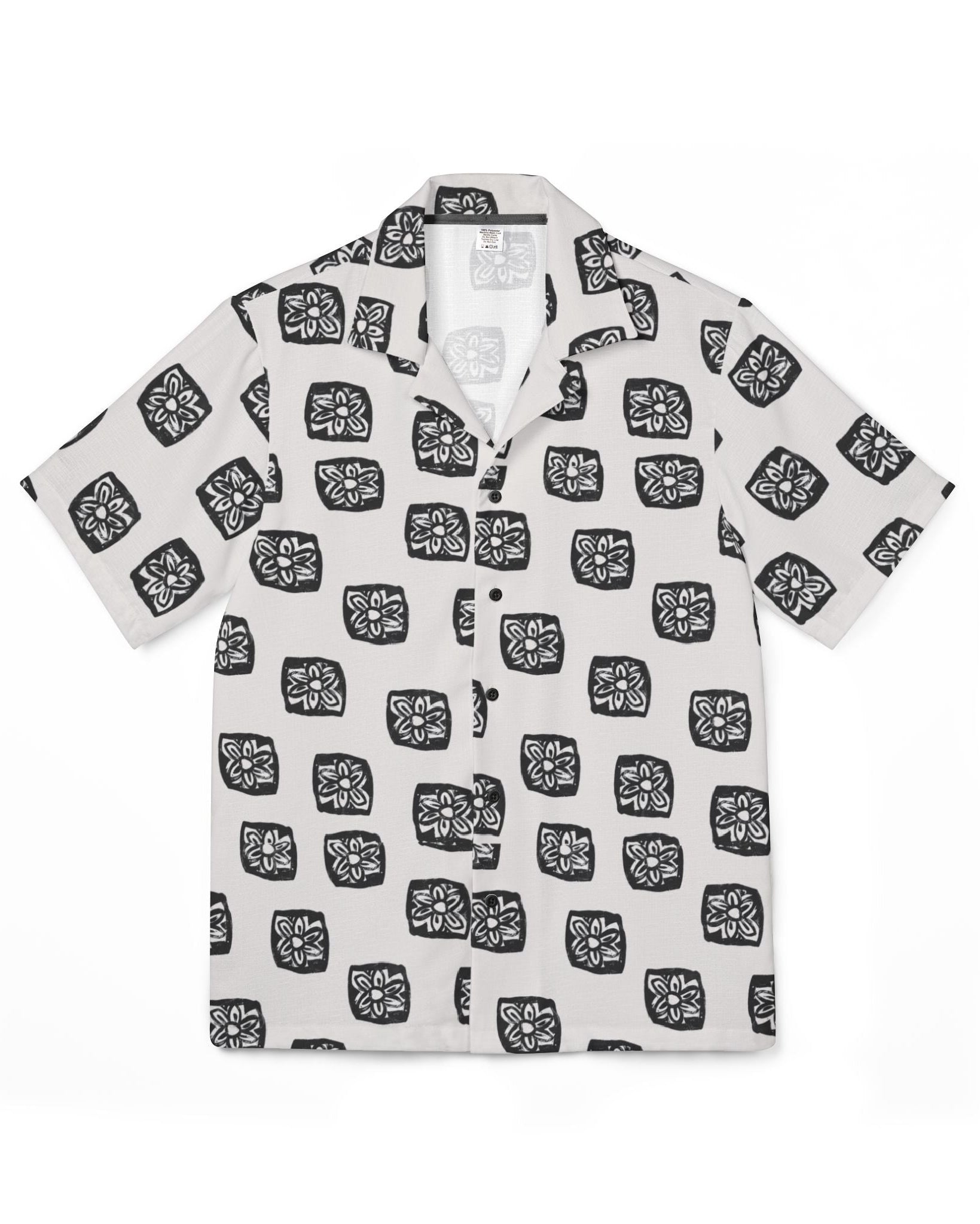 White shirt with black geometric pattern on a white background