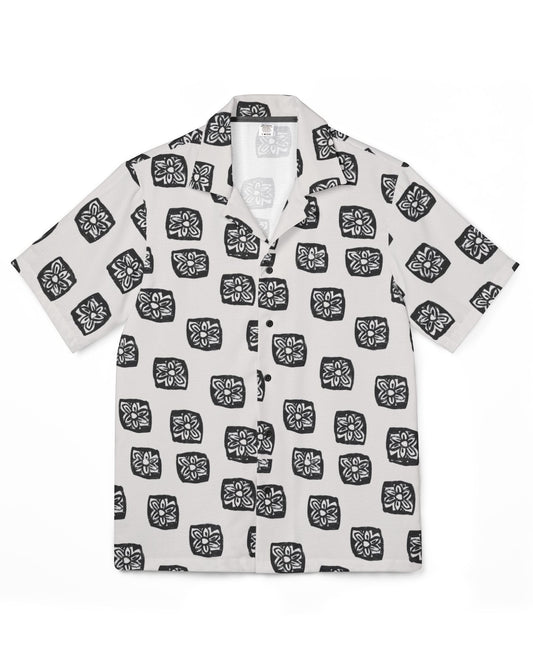 White shirt with black geometric pattern on a white background